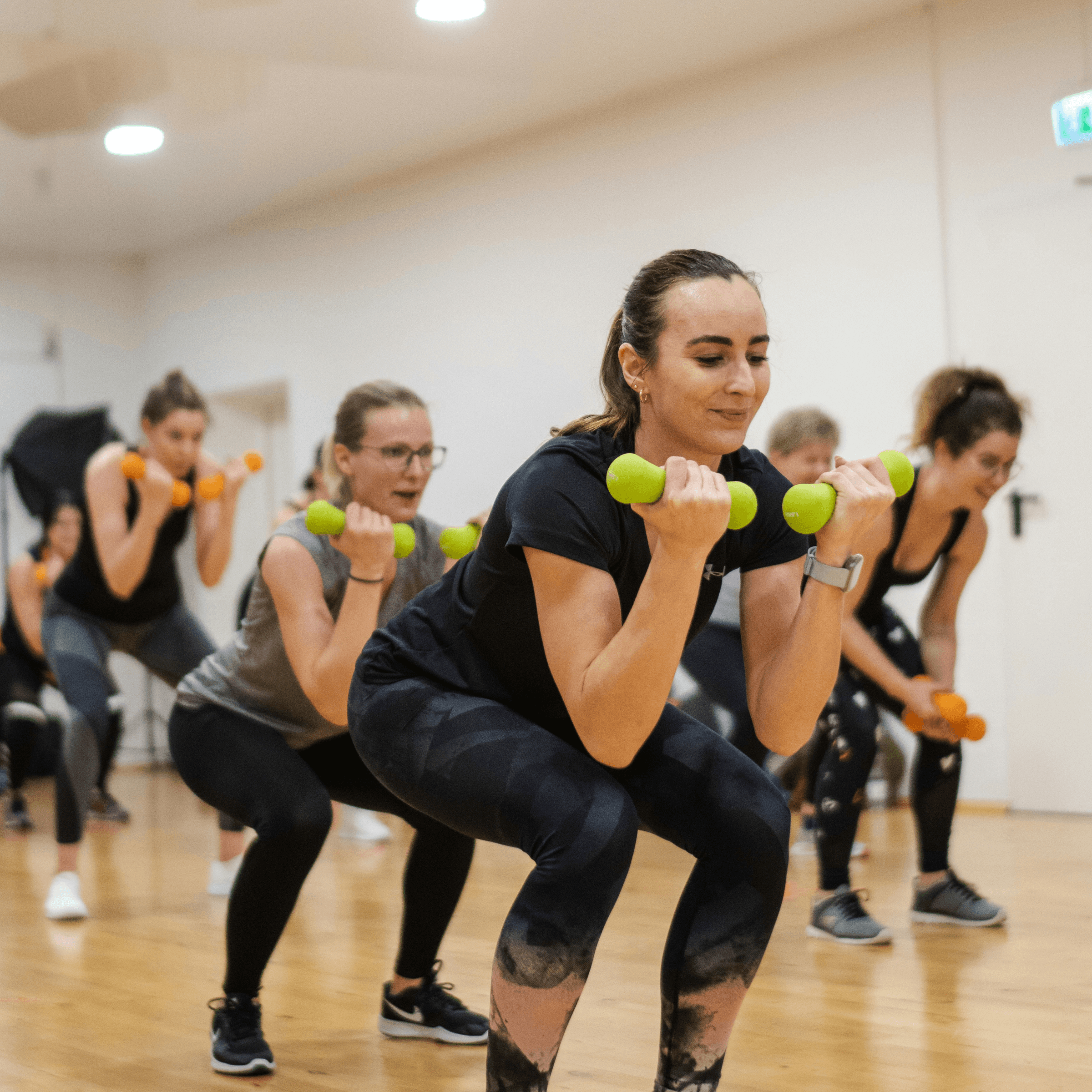 Hot Pilates group class in session
